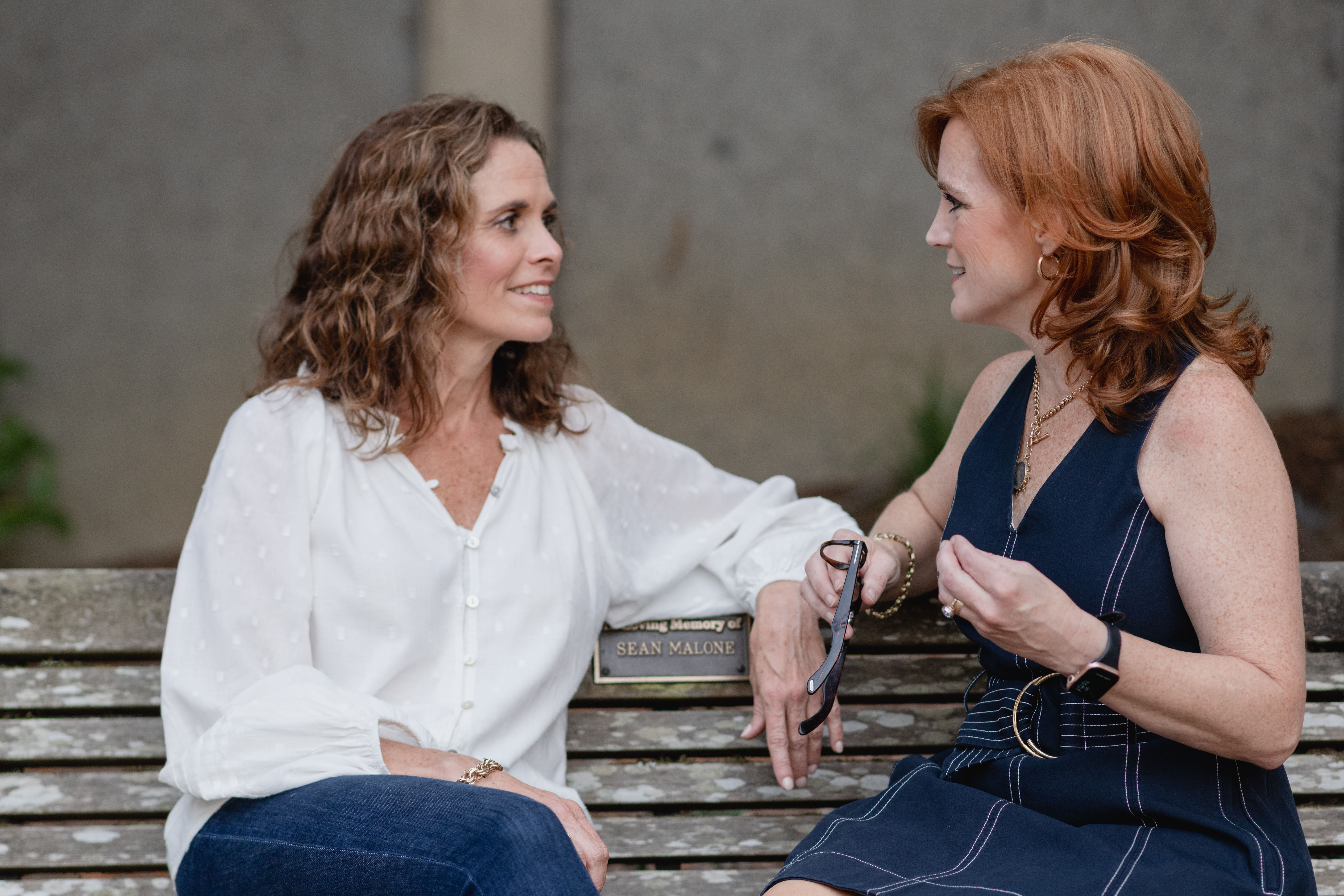 Two women consulting about personal branding